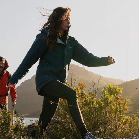 women hiking in black outdoor pants