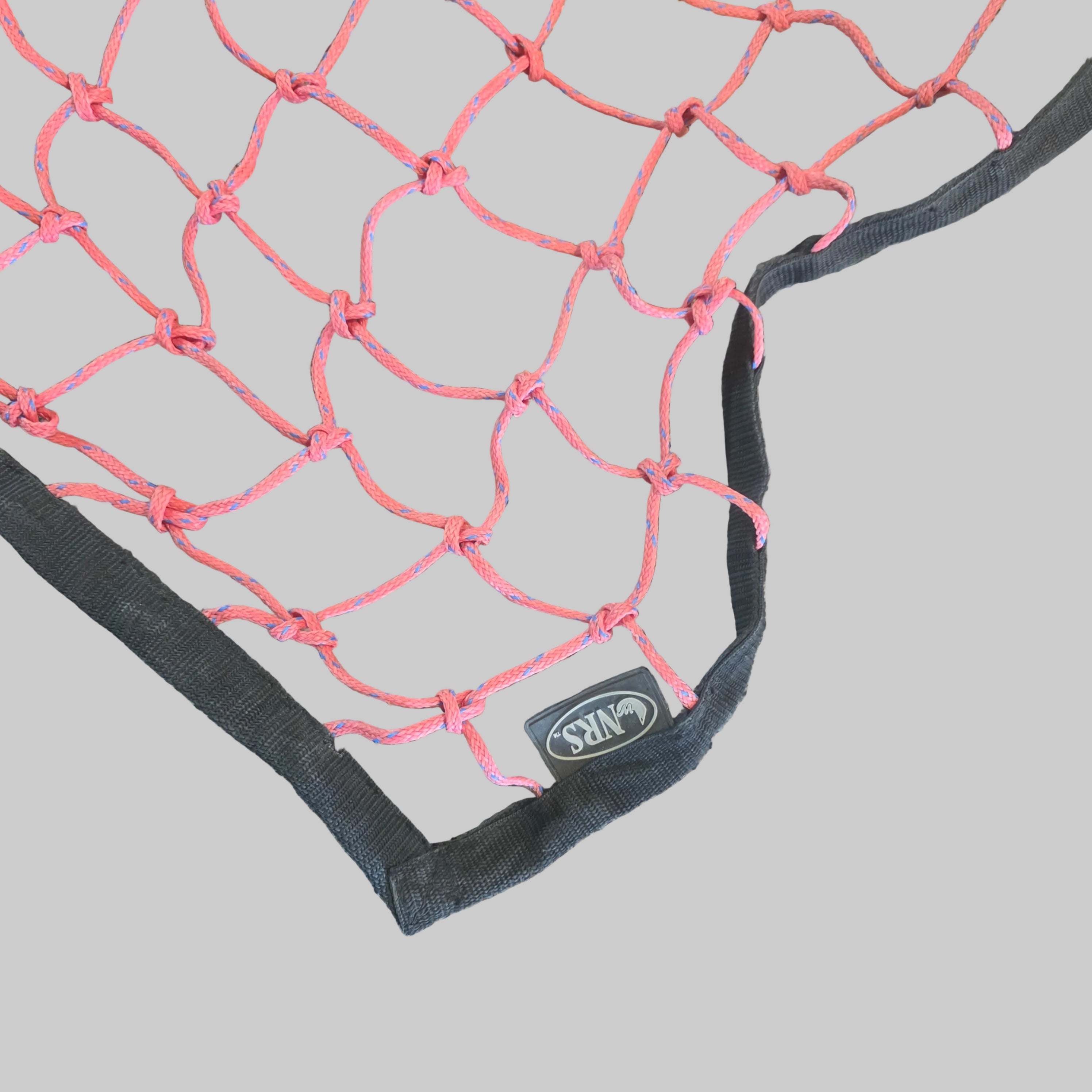 Pink mesh cargo net with a black fabric border and a visible black oval patch showing the brand name 'M-AX'.
