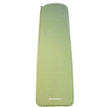 A light green Quechua camping sleeping pad laid flat on a gray carpeted floor.