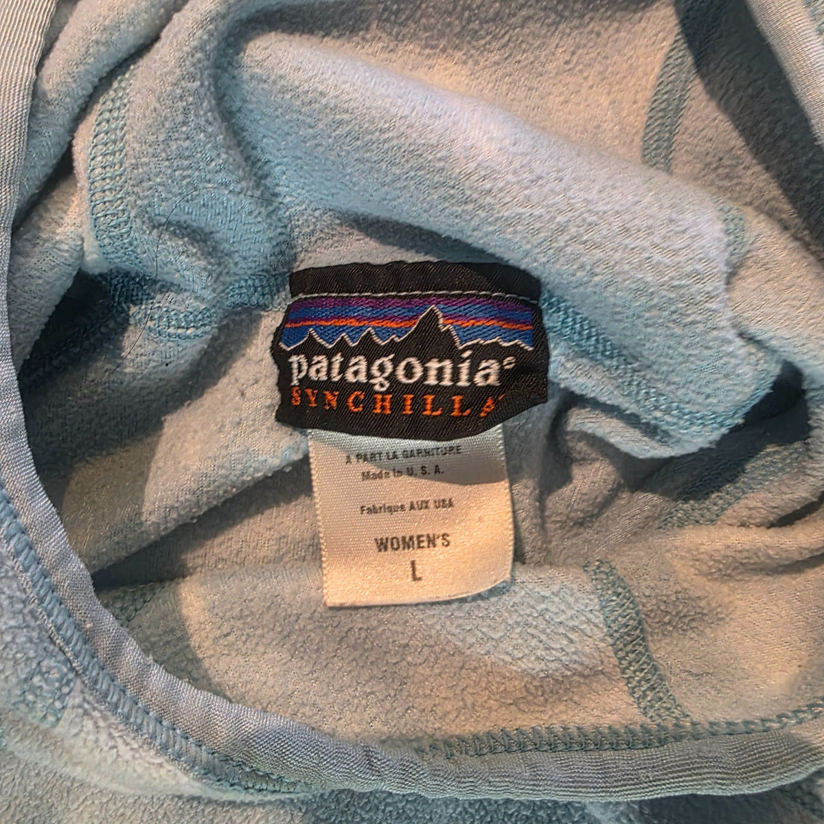 Patagonia women's large label and fleece interior