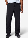 Person wearing black pants on a white background